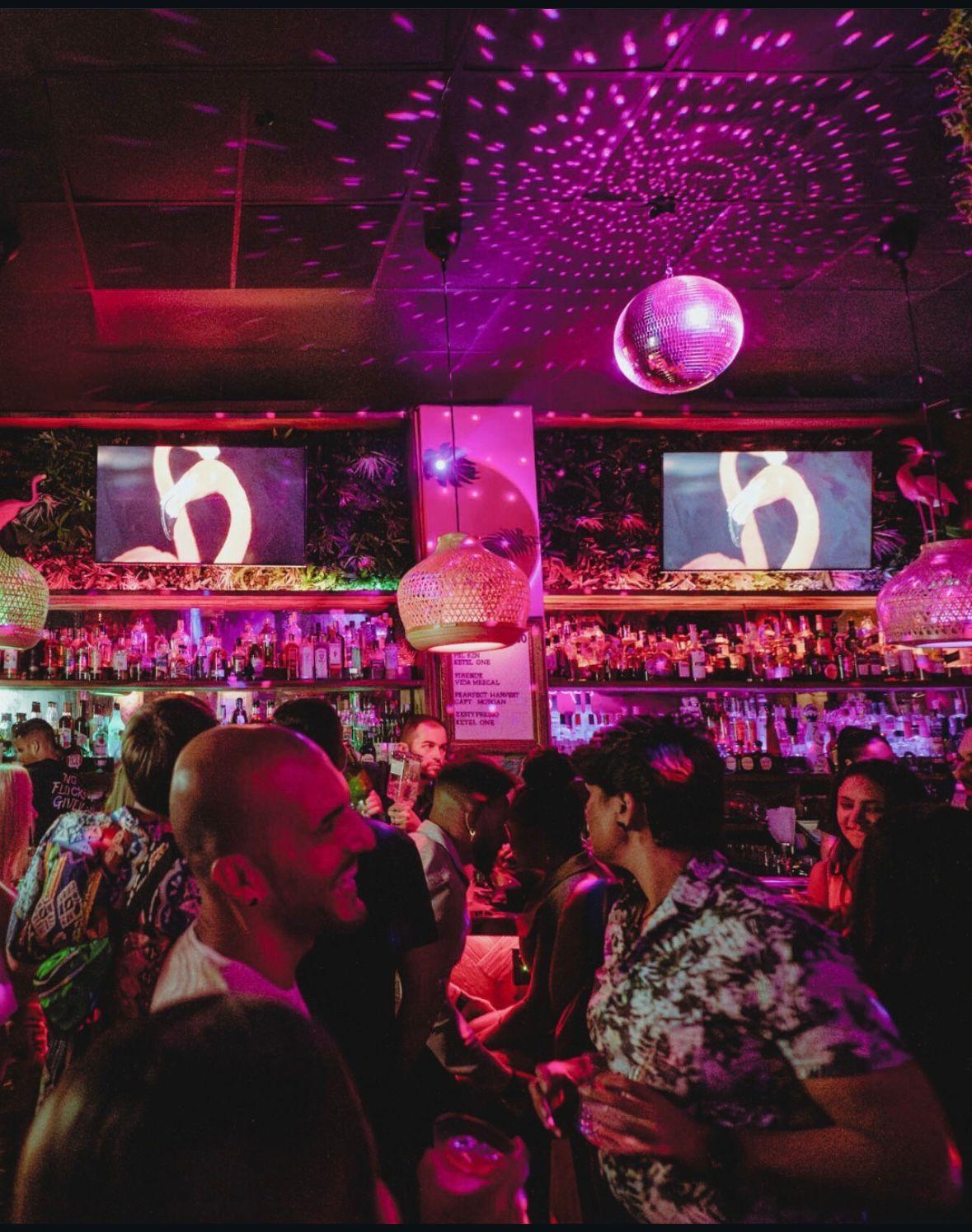 Guests in Masquerade masks enjoying VVIP area